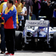The late Venezuelan president Hugo Chavez getting chummy with his state-supported F1 driver, Pastor Maldonado, in happier times of 2011. Photo Credit: AP